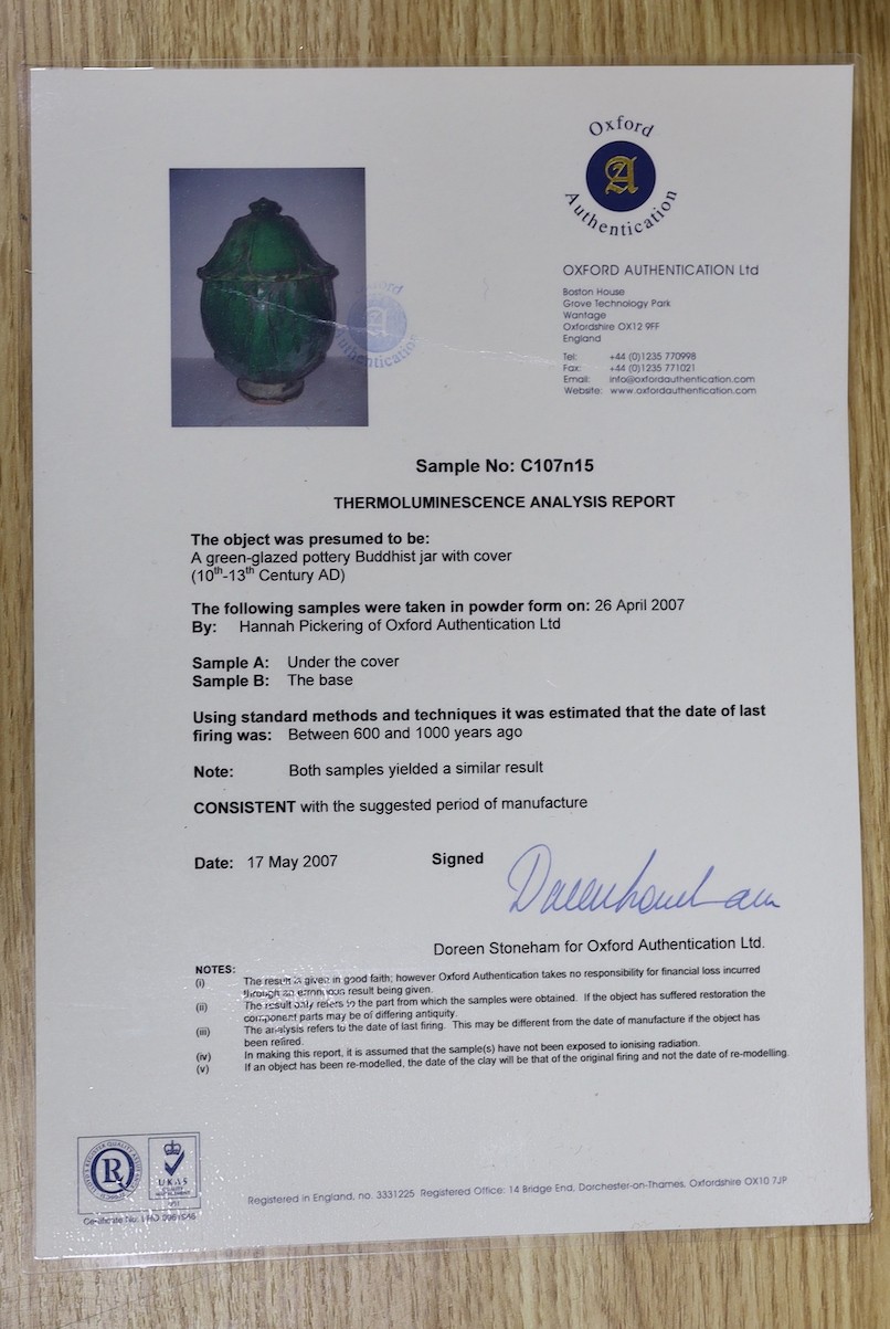 A Buddhist green glazed pottery jar and cover, 10th - 13th century. Thermoluminescence analysis report included, 43cm